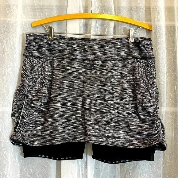Athleta Dresses & Skirts - ATHLETA Women’s XL Running Tennis Mini Skirt Shorts Black White Zipper Pocket